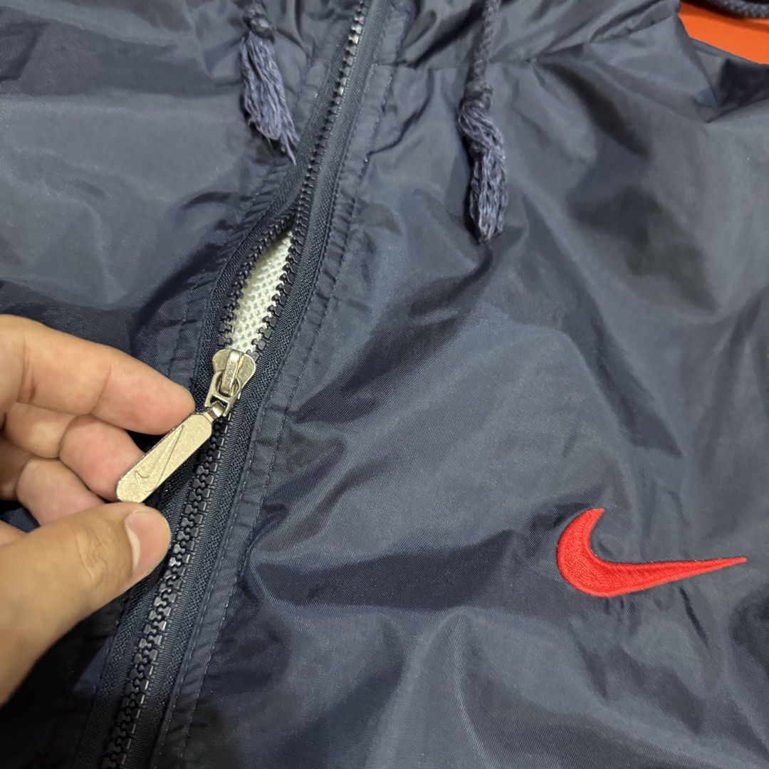 VINTAGE NIKE WINDBREAKER WITH PACKABLE HOOD (Category: Coats, Jackets and Outerwear) located in Pasig City. Submitted by buzzthrifty (Listing ID 1465307306, Image 3). Description: SIZS 2-3XL 26x29 GOOD AS NEW .