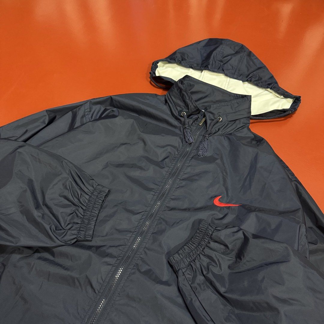 VINTAGE NIKE WINDBREAKER WITH PACKABLE HOOD (Category: Coats, Jackets and Outerwear) located in Pasig City. Submitted by buzzthrifty (Listing ID 1465307306, Image 2). Description: SIZS 2-3XL 26x29 GOOD AS NEW .