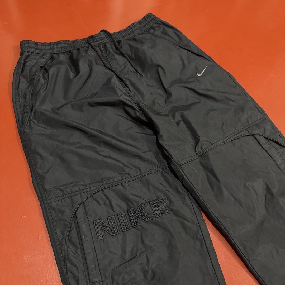VINTAGE NIKE Y2K WOVEN PANTS (Category: Trousers) located in Pasig City. Submitted by buzzthrifty (Listing ID 1465308474, Image 3). Description: SIZE 30-36WAIST 40" LENGTH 9" HEM EXCELLENT CONDITION .