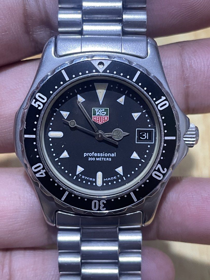 Vintage Tag Heuer Quartz (Category: Men's Watches) located in Taguig. Submitted by tester1x (Listing ID 1465230108, Image 3). Description: Secondhand Used Watch Vintage Tag Heuer Swiss Made 973.013 R B39846 Quartz Black Dial 32mm Bezel 35mm Case Sapphire Crystal Stainless Steel Case Tag Stainless Steel Bracelet “Watch Only” .