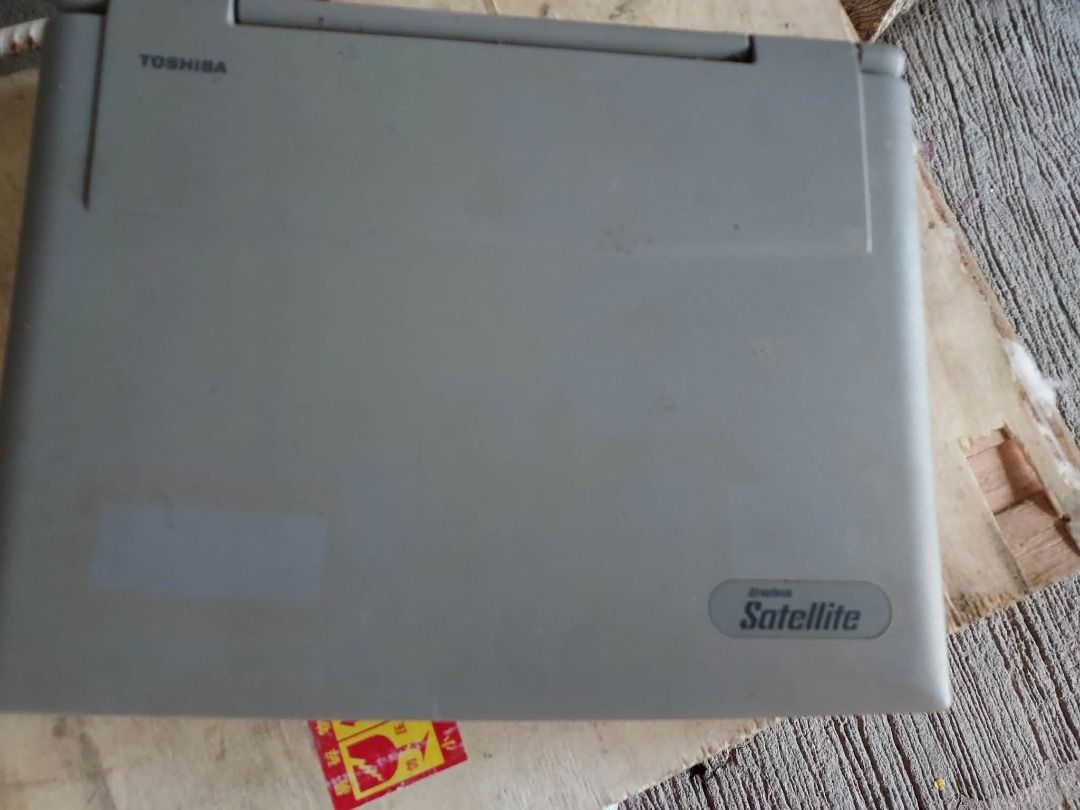 Vintage Toshiba Satellite Notebook (Category: Laptops & Notebooks) located in Iloilo. Submitted by vixxxenvintage2023 (Listing ID 1465293010, Image 1). Description: Selling this Vintage Toshiba Satellite Notebook ISSUE: not running, No battery charger and has screen defect Runs Old 90s Windows program, Ideal for someone who wants to recondition, repair operate an Old Vintage Laptap Color: Grey Selling as is Price Still Negotiable Payment : VIa Gc