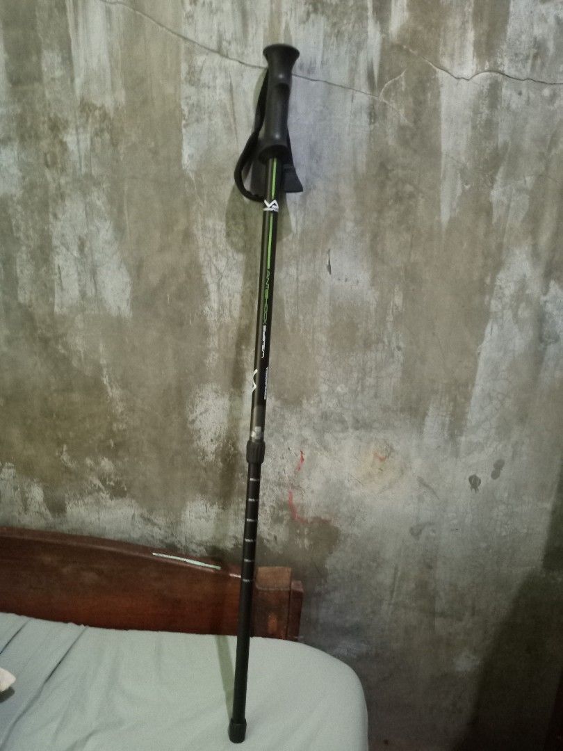 Visionpeaks Antishock System Trekking Pole Hiking Stick (Category: Hiking & Camping) located in Tagum. Submitted by its_yoboii (Listing ID 1465210677, Image 1). Description: - Brand/Model: Visionpeaks trekking pole - Color: Black and green design - Features: Anti-shock system, ergonomic grip handle, and adjustable wrist strap - Mechanism: Twist-lock height adjustment on the shaft - Ideal for: Hiking, camping, and outdoor trail walking.