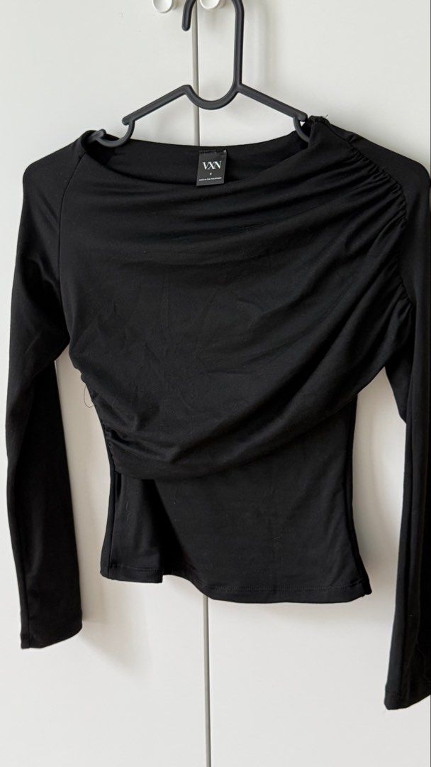 VXN Black Long Sleeve Draped Ruched Top Size S (Category: Longsleeves) located in Manila. Submitted by matchathena (Listing ID 1465202535, Image 3). Description: - Brand: VXN - Size: Small - Color: Black - Design: Asymmetric draped with front and one-shoulder ruched detailing - Fit: Fitted cut with soft, stretchy fabric - Style: Versatile basic for casual wear or going out.