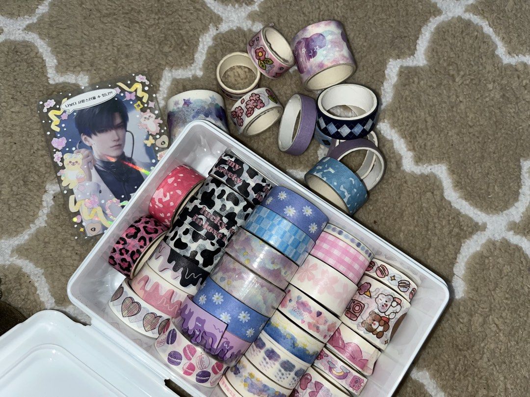 Washi Tape Collection Set with Various Designs (Category: Craft Supplies & Tools) located in Tarlac. Submitted by yuejunnie (Listing ID 1465245739, Image 1). Description: - Massive washi tape collection - Includes a variety of cute patterns: cow print, flowers, checkered squares, gradients, and cartoon icons - Not all are brand new, some are used and some are sealed - Perfect bulk lot for journaling, scrapbooking, and DIY crafting projects *May r