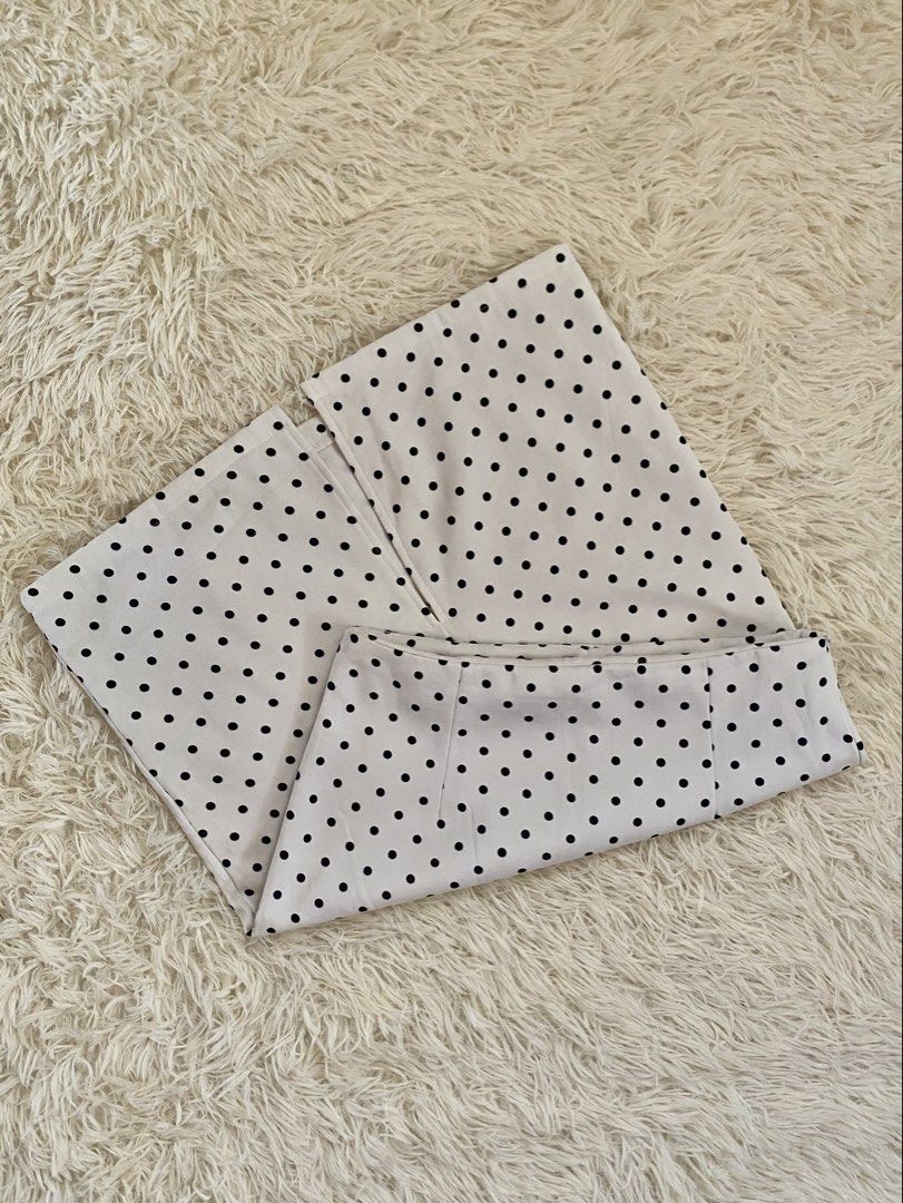 White and Black Polka Dot Skirt (Category: Skirts) located in Guagua. Submitted by zenn_vi (Listing ID 1465273467, Image 1). Description: - Color & Pattern: White with all-over black polka dots - Waistband: Structured with clean stitching and finished edges - Versatility: Easily dresses up for the office or down for weekends - Wardrobe Staple: A classic, timeless piece that matches many tops.