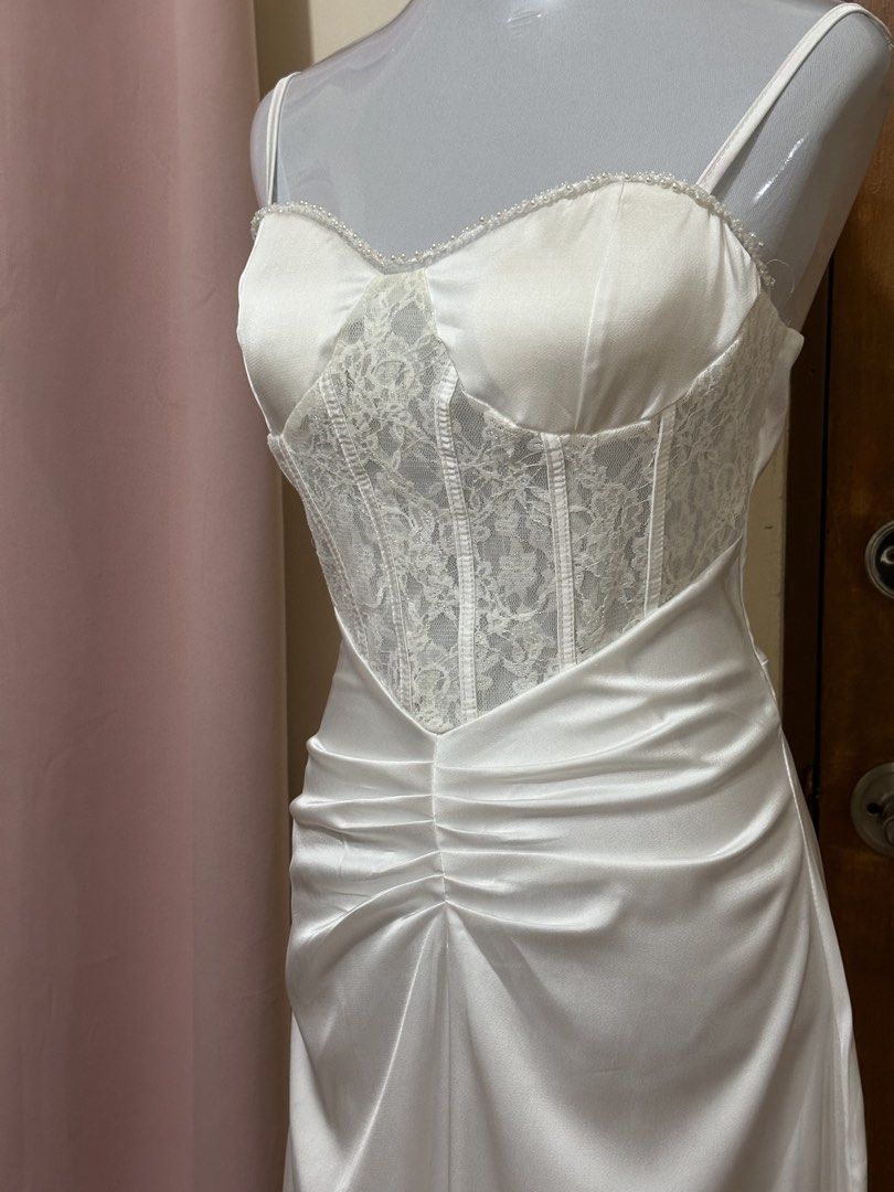 White Corset Long Dress (Category: Dresses) located in Manila. Submitted by vesti-da (Listing ID 1465232366, Image 3). Description: Long, straight-flowing floor-length skirt Best for pre-nup shoot or covil wedding Simple but elegant look when worn.