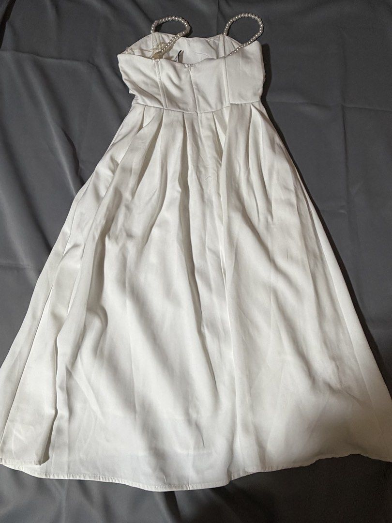 White pearl strapped dress (Category: Dresses) located in Caloocan City. Submitted by prelovedbyfe08 (Listing ID 1465313027, Image 3). Description: used once as a graduation dress 📍south caloocan sf shouldered by buyer.