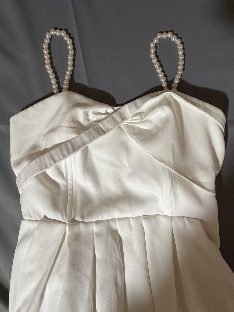 White pearl strapped dress (Category: Dresses) located in Caloocan City. Submitted by prelovedbyfe08 (Listing ID 1465313027, Image 2). Description: used once as a graduation dress 📍south caloocan sf shouldered by buyer.