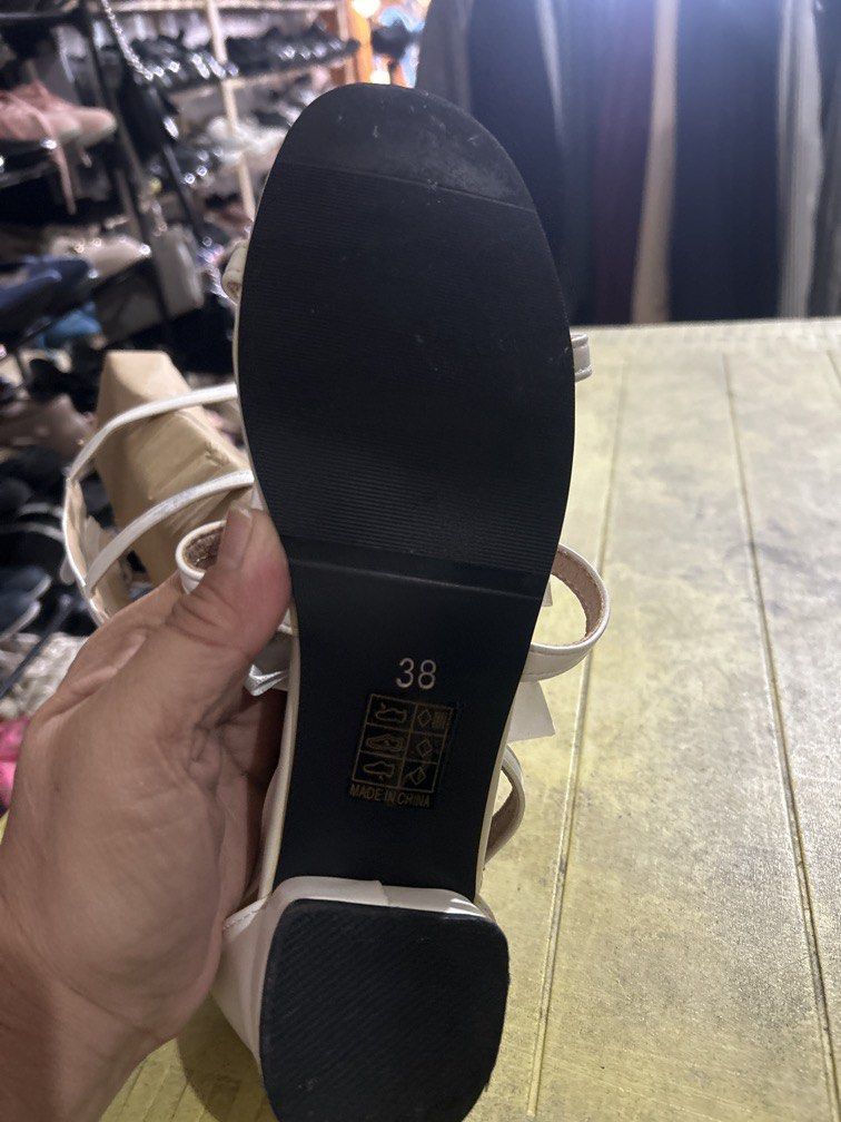 White satin knee -high gladiator style sandal 38 (Category: Flats & Sandals) located in Cavite. Submitted by cecitrifthshop (Listing ID 1465212768, Image 2). Description: White satin bow knee-high sandals size 38 still in good condtion origin in japan .