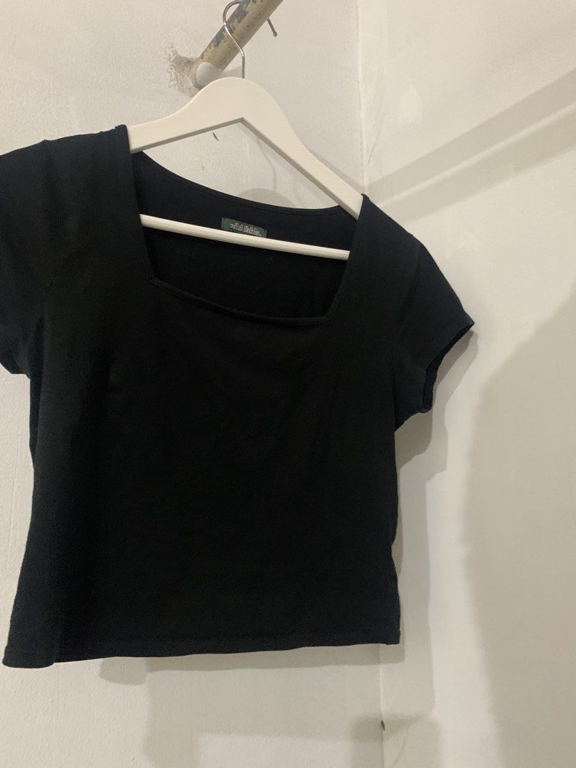 Wild Fable Black Square Neck Crop Top (Category: Sleeveless) located in Manila. Submitted by spaceshop12345 (Listing ID 1465216009, Image 1). Description: - Brand: Wild Fable - Color: Black - Size: S (Made in Guatemala) - Design: Square neckline with short sleeves - Material: Soft and comfortable fabric - Style: Versatile basic piece, perfect for pairing with high-waisted jeans or skirts for everyday casual wear.