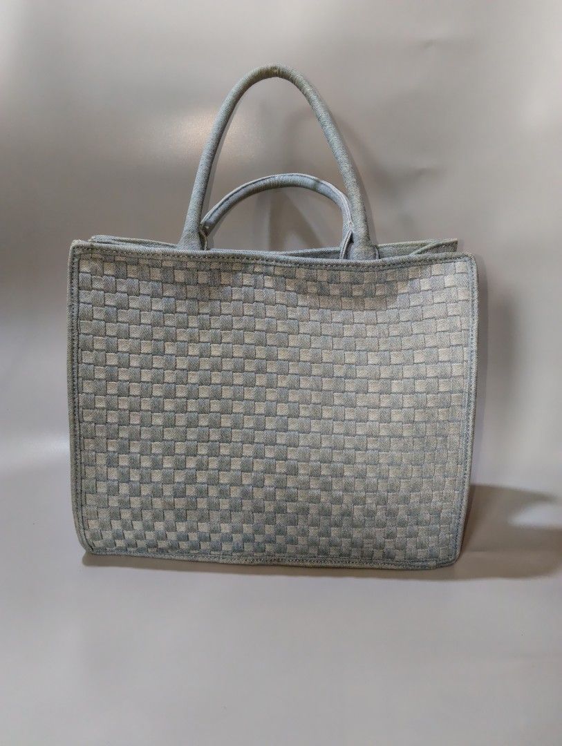 Woven Denim-Style Tote Bag (Category: Tote Bags) located in Cagayan de Oro. Submitted by warmbird-f84aab (Listing ID 1465252794, Image 1). Description: Light Blue Woven Denim-Style Tote Bag 💎 Chic & Spacious — Everyday / OOTD Bag ✅ Excellent Pre-loved Condition ✅ No flaws, clean inside & out ✅ Material: Polyurethane/Weave fabric ✅ Size: 182mm | Black inner lining, zip pocket + card slot 📍 From Mindanao | Shipping nationwide.