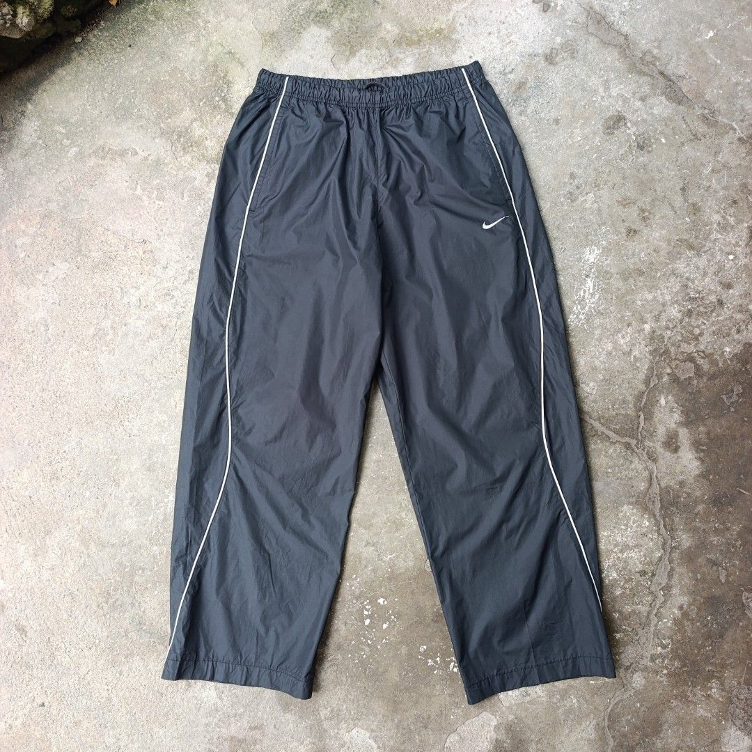 Y2k Nike Track Pants (Category: Joggers) located in Aritao. Submitted by kami.seta (Listing ID 1465186062, Image 2). Description: WAIST-30-38 (safe to stretch) LENGTH-38½ THIGH-14½ HEM-9½ COLOR & CONDITION-9.5/10 ISSUE-hole sa waistline .