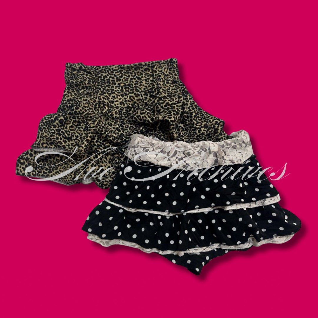 Y2K Ruffled Trim Miniskirts Bundle (Category: Skirts) located in Manila. Submitted by ave.archives (Listing ID 1465368945, Image 1). Description: Y2K Mini Skirts Bundle Piece 1: Classic leopard/cheetah print tiered ruffled skirt. Piece 2: Black and white polka dot tiered skirt accented with delicate lace trim. S-M (Waist 24-27)|Condition: Like new Quezon City | Lalamove & J&T ready.