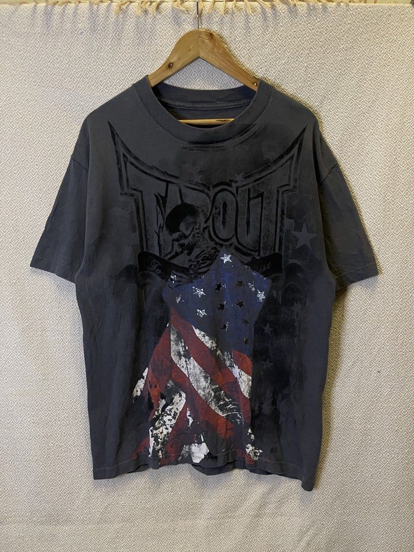 Y2k tapout skull shirt (Category: Tshirts & Polo Shirts ) located in Manila. Submitted by hypestock_mnl (Listing ID 1465207637, Image 1). Description: - stylish - perfect for casual wear - great fit - in good condition - minimal signs of usage - 9/10 - money worth! - need wash - see pics for details/issue.