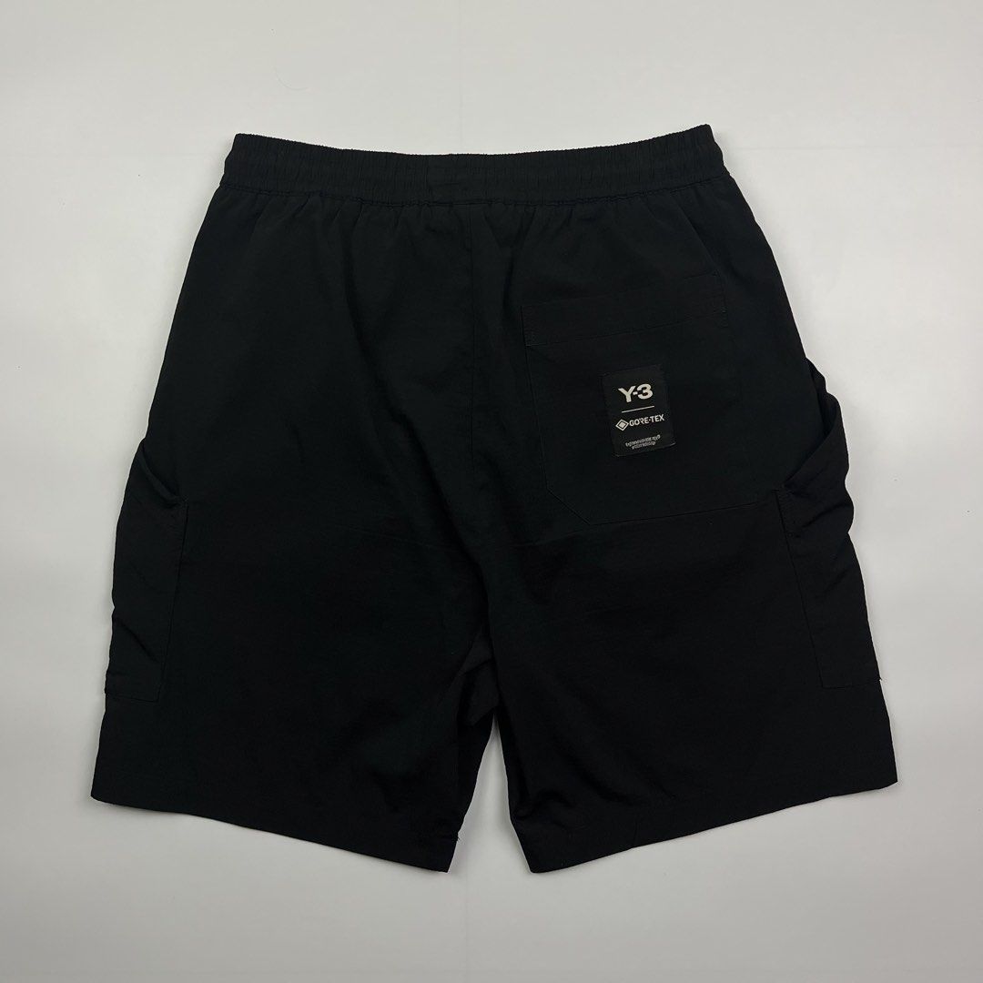 Y-3 x Adidas Multi-Pocket Cargo Short (Category: Shorts) located in Puerto Princesa. Submitted by paradise5300 (Listing ID 1465206995, Image 2). Description: Y-3 x Adidas Multi-Pocket Cargo Short Tagged Size: M (29-34) Dimensions Inches length: 19 Inches waist (width): 14.5 inseam: 14.5 thigh opening: 11 Condition: Excellent Color rate: 9.5 Flaws: Minor signs of usage 1,299 shipping fee is not yet included..