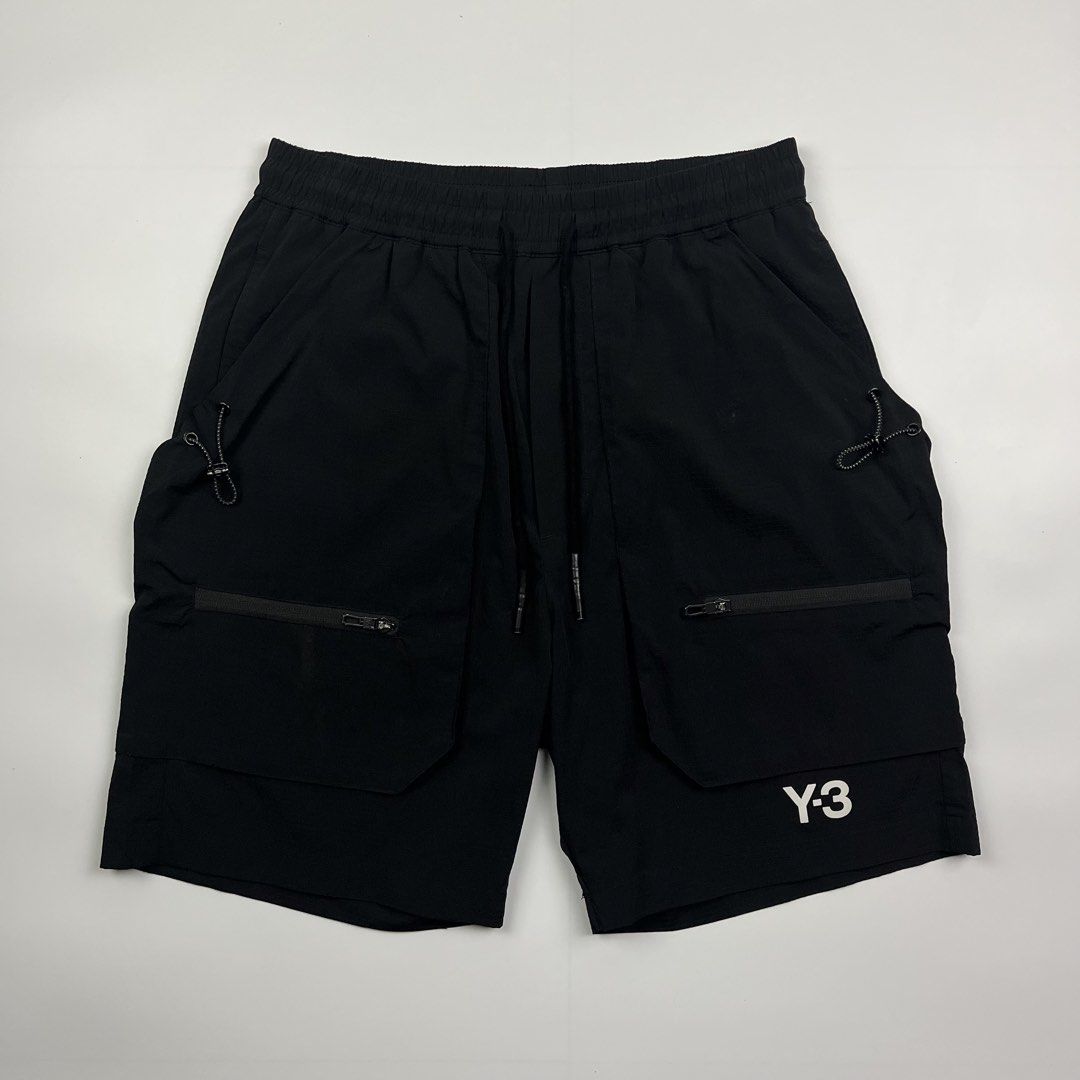 Y-3 x Adidas Multi-Pocket Cargo Short (Category: Shorts) located in Puerto Princesa. Submitted by paradise5300 (Listing ID 1465206995, Image 1). Description: Y-3 x Adidas Multi-Pocket Cargo Short Tagged Size: M (29-34) Dimensions Inches length: 19 Inches waist (width): 14.5 inseam: 14.5 thigh opening: 11 Condition: Excellent Color rate: 9.5 Flaws: Minor signs of usage 1,299 shipping fee is not yet included..