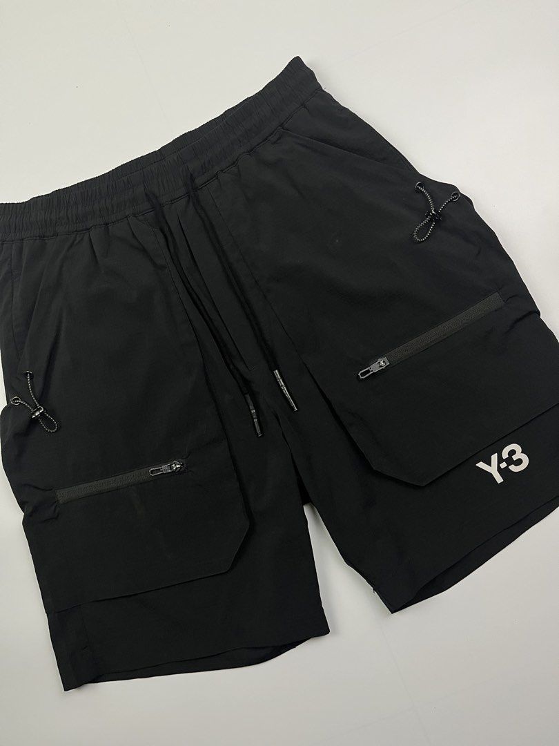Y-3 x Adidas Multi-Pocket Cargo Short (Category: Shorts) located in Puerto Princesa. Submitted by paradise5300 (Listing ID 1465206995, Image 3). Description: Y-3 x Adidas Multi-Pocket Cargo Short Tagged Size: M (29-34) Dimensions Inches length: 19 Inches waist (width): 14.5 inseam: 14.5 thigh opening: 11 Condition: Excellent Color rate: 9.5 Flaws: Minor signs of usage 1,299 shipping fee is not yet included..