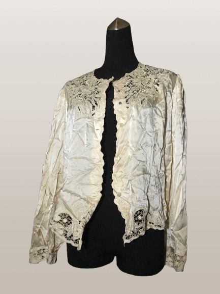CREAM SILK BLOUSE CARDIGAN (Category: Longsleeves) located in Marikina City. Submitted by minimalistmanila (Listing ID 1465228850, Image 2). Description: Vintage 100% silk cream blouse cardigan. Hand embroidered. Medium. Exquisite style. Needs wash as kept in storage. Order now!.