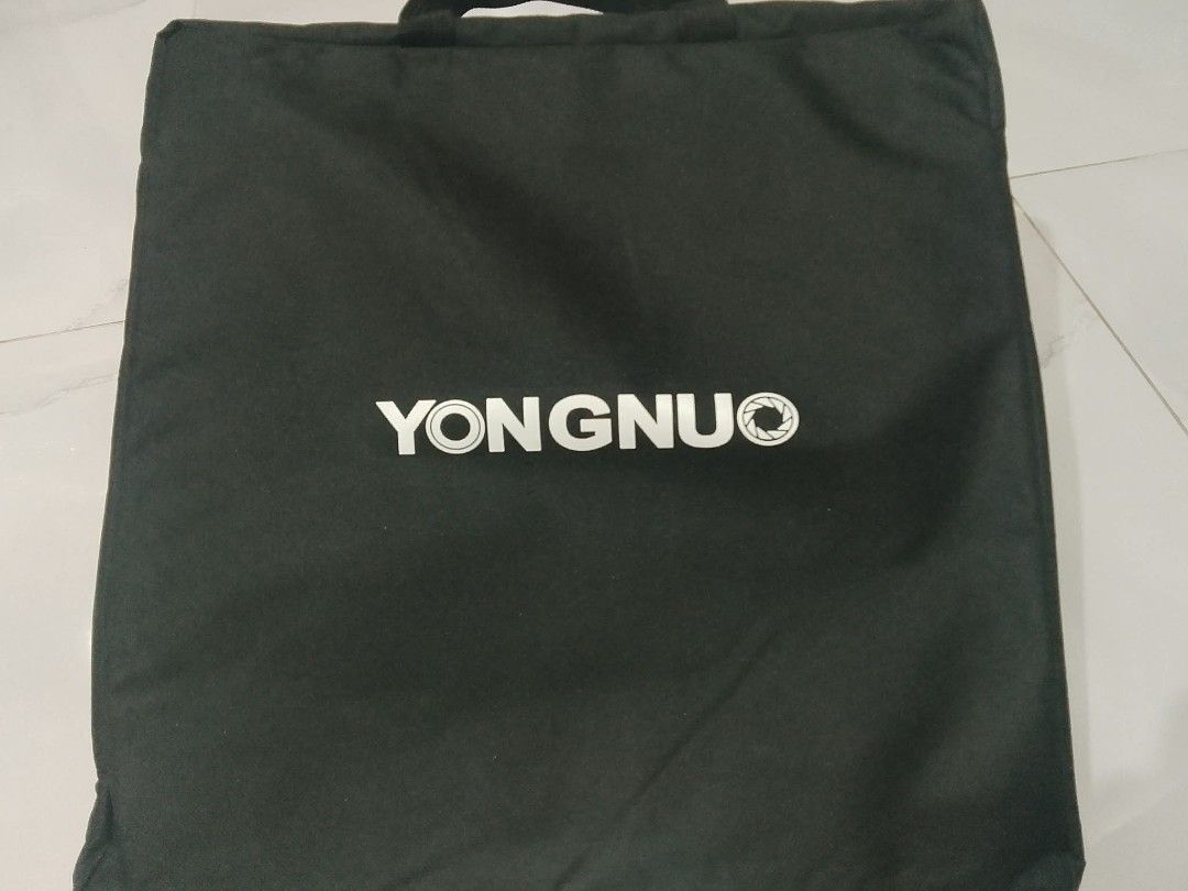 Yongnuo YN6000 LED Video Light (Category: Lighting & Studio Equipment) located in Manila. Submitted by mewatch29 (Listing ID 1465206377, Image 3). Description: Yongnuo YN6000 LED Video Light professional studio and interview panel light. Light Performance • Light Source: 600 high-indicator LED lamp beads (Available in either a solid 5600K Daylight version or a 3200K–5600K Bi-Color version). • Luminous Flux: 4650 to 4800 Lumens. • Color Accuracy: 