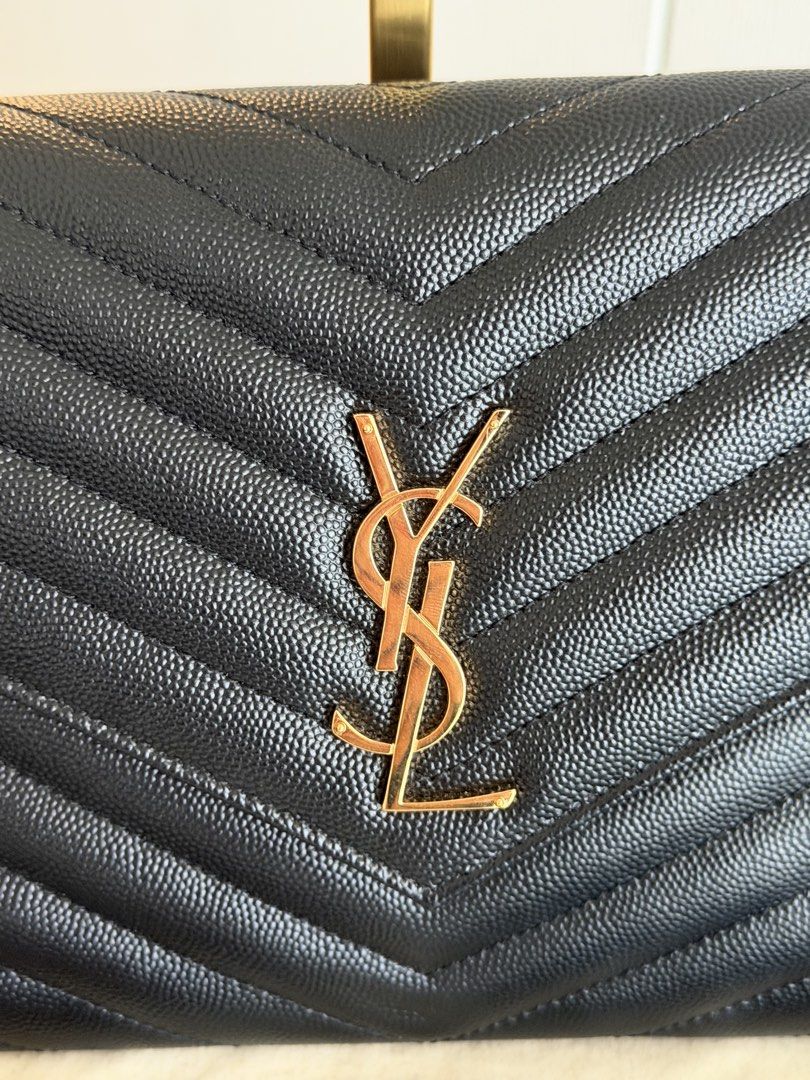 YSL Clutch (Category: Luxury Bags & Wallets) located in Paranaque City. Submitted by elysialuxuryph (Listing ID 1465378419, Image 2). Description: No flaws Excellent Comes with dustbag, cards/booklet, and COA.