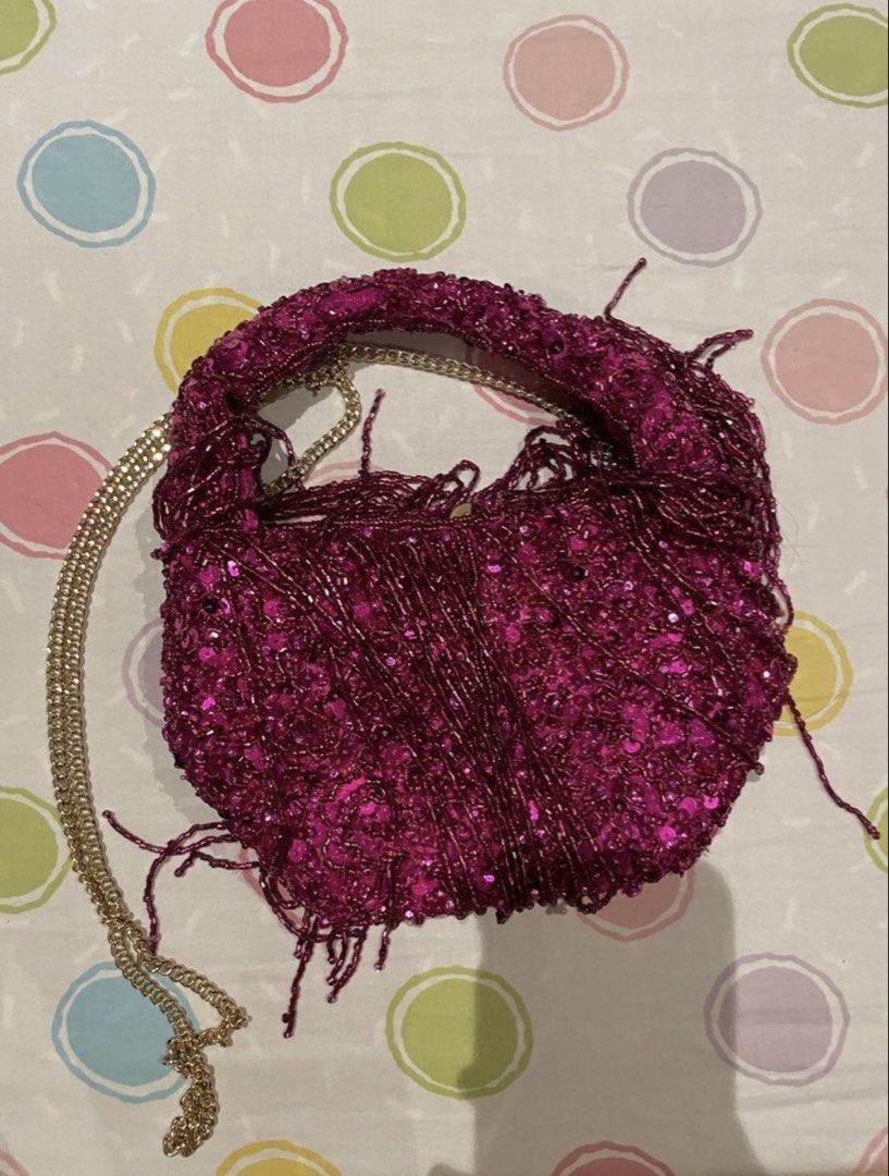 Zara Beaded Sequin Fringe Mini Bag Magenta (Category: Purses & Pouches) located in Taguig. Submitted by cftbncs (Listing ID 1465363937, Image 3). Description: - Brand: Zara - Color: Bright magenta pink - Details: Covered in shimmering sequins and hanging beaded fringe - Interior: Smooth satin lining with original store tag still attached - Closure: Secure magnetic snap - Strap: Detachable gold chain included - Condition: Brand new with tags - Sty