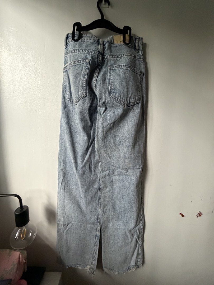 ZARA High-waisted jeans (Category: Jeans) located in Las Pinas. Submitted by bibliomomma (Listing ID 1465234874, Image 2). Description: high-waisted, straight leg Zara jeans feature a light acid wash finish and raw, frayed hem detailing for a trendy, laid-back vibe No photo when worn Waist when laid flat 12.5 inches Length 41 inches.