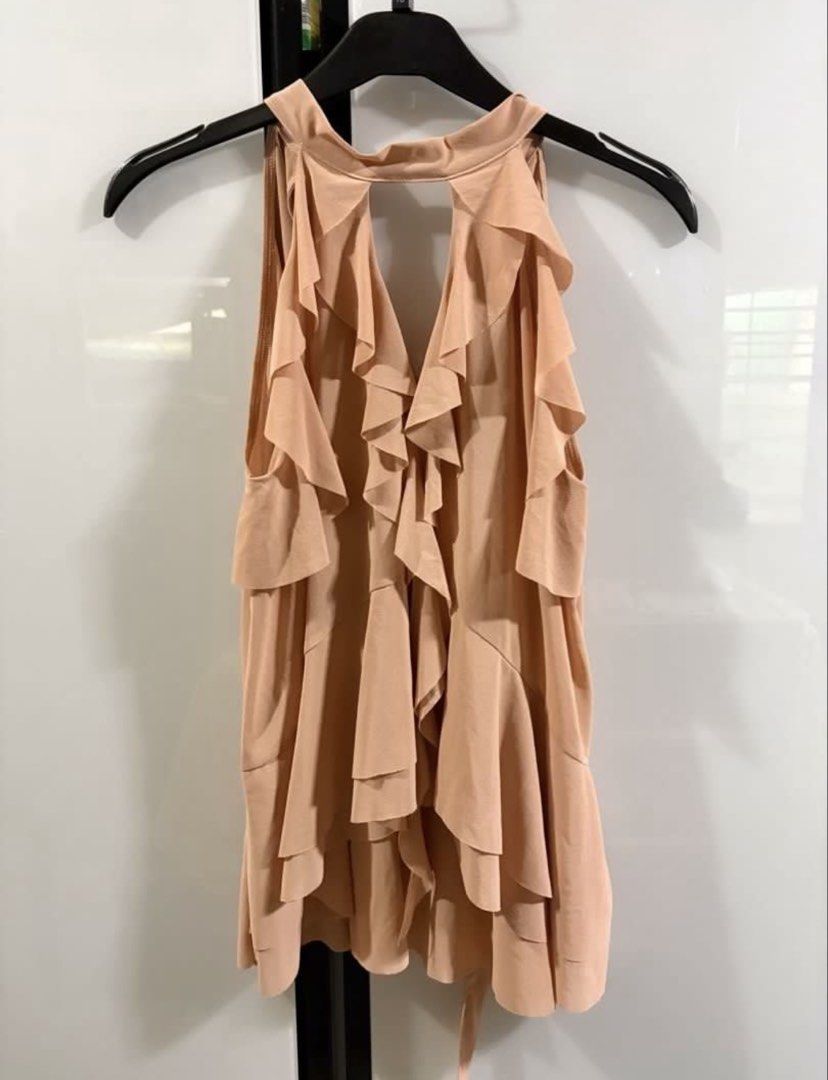 Zara Pink Ruffle Halter Neck Top (Category: Sleeveless) located in Manila. Submitted by vls10 (Listing ID 1465339419, Image 3). Description: Lowballers won’t be entertained! Pls be reasonable with your offers :) - Authentic and brand new with tags! - Color: Muted Pink - Size M - No flaws or anything :) - Very elegant; can also be used for formal events with trousers! selling for only PHP 750! 📍: Quezon City (near city hall) 💵: Gcash/ BPI Bank T