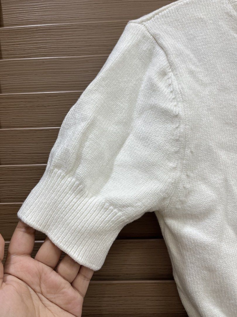 Zara White Cardigan With Silver Beads Size M (Category: Coats, Jackets and Outerwear) located in Mabalacat. Submitted by fashionclothesph (Listing ID 1465307398, Image 3). Description: - Brand: Zara - Size: M (tag attached) - Color: White - Style: Short-sleeve knit cardigan with silver metallic ball neckline embellishments - Details: Ribbed cuffs and hem - Material: 55% viscose, 25% polyester, 20% polyamide.