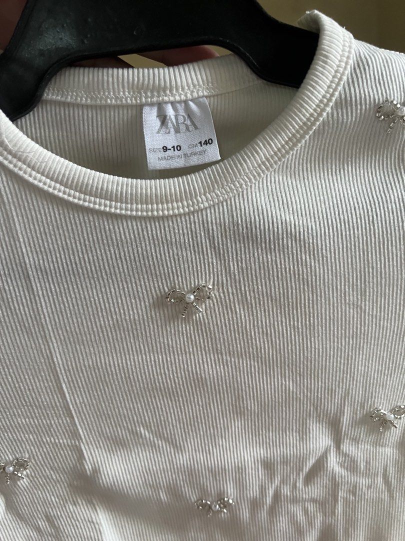 Zara white knitted top (Category: Babies & Kids Fashion) located in Imus. Submitted by labella.mnl (Listing ID 1465258413, Image 3). Description: Last price posted Size 140cm No flaws Good as new .