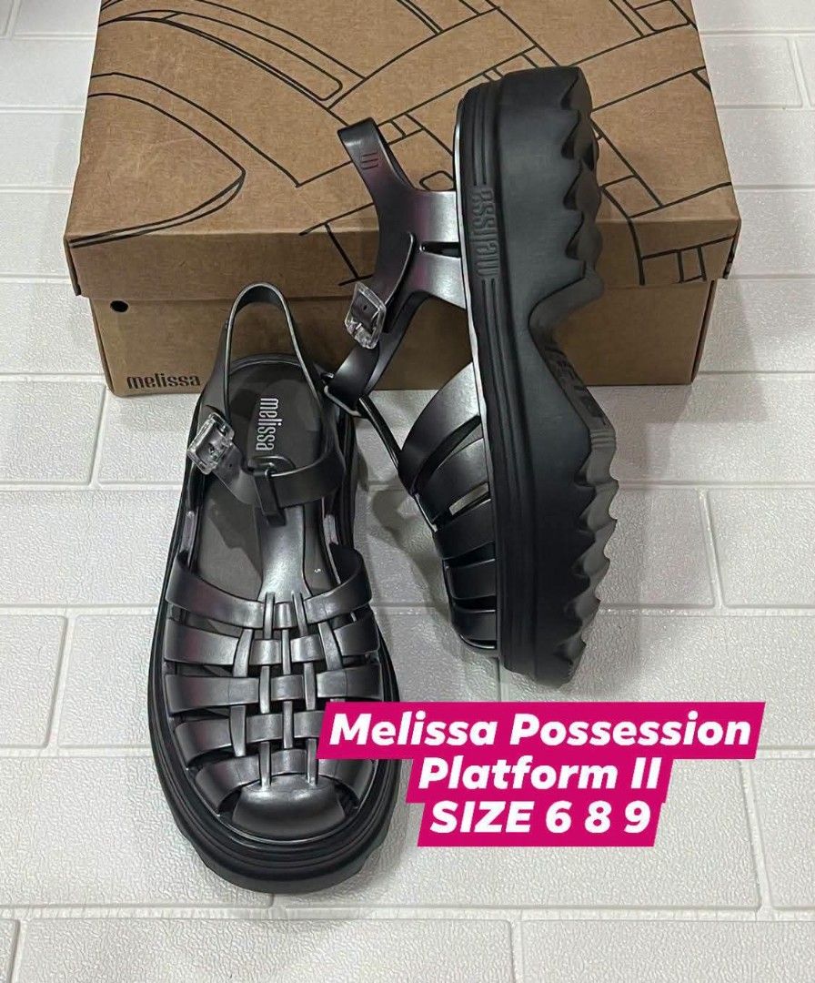 100% ORIGINAL MELISSA (Category: Wedges) located in Manila. Submitted by mydytrends (Listing ID 1467010101, Image 1). Description: NEGO PRICE FOR SURE BUYER 🥰 - 100% Original Melissa brand - Model: Possession Platform II - Color: Metallic gunmetal / black - Sizes available: 6, 8, 9 - Features a trendy fisherman jelly weave design with a chunky platform sole - Made of durable, flexible, and bubblegum-scented signature Melissa material - Brand new