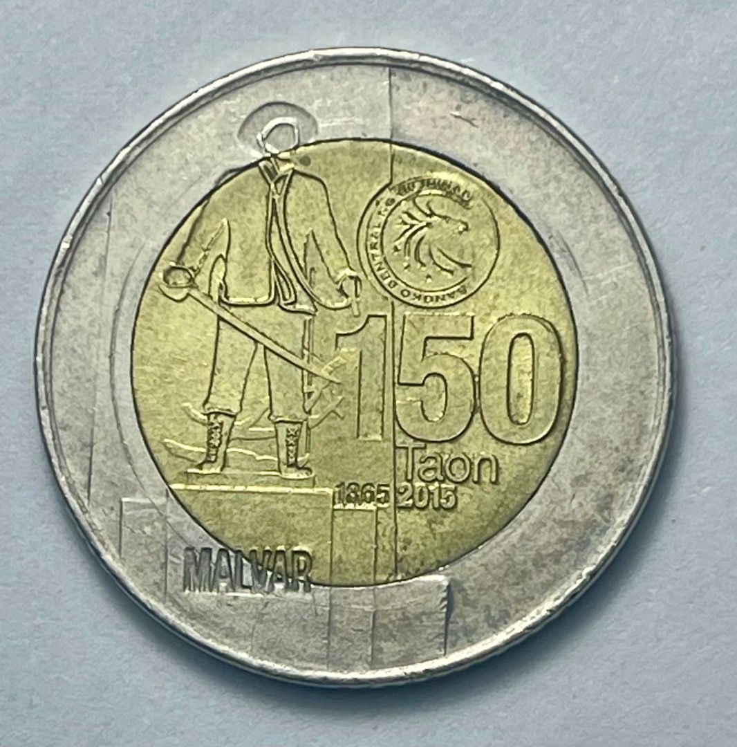 2015 Ten Piso Commemorative Coin (Category: Currency) located in Mandaluyong City. Submitted by brightbear_6d8f63 (Listing ID 1467093935, Image 2). Description: Heneral Miguel Malvar five piso coin. Error coin..