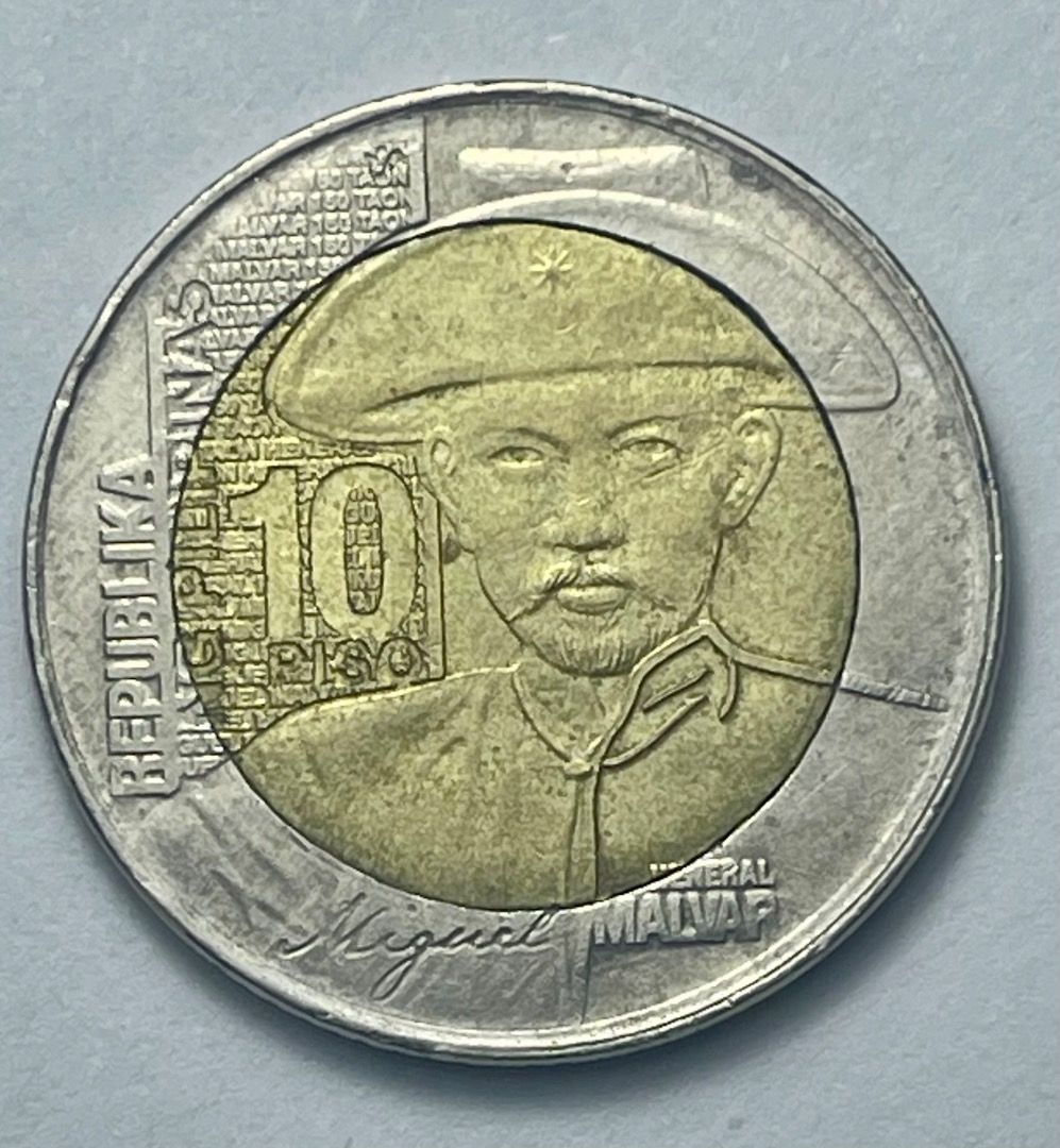 2015 Ten Piso Commemorative Coin (Category: Currency) located in Mandaluyong City. Submitted by brightbear_6d8f63 (Listing ID 1467093935, Image 1). Description: Heneral Miguel Malvar five piso coin. Error coin..