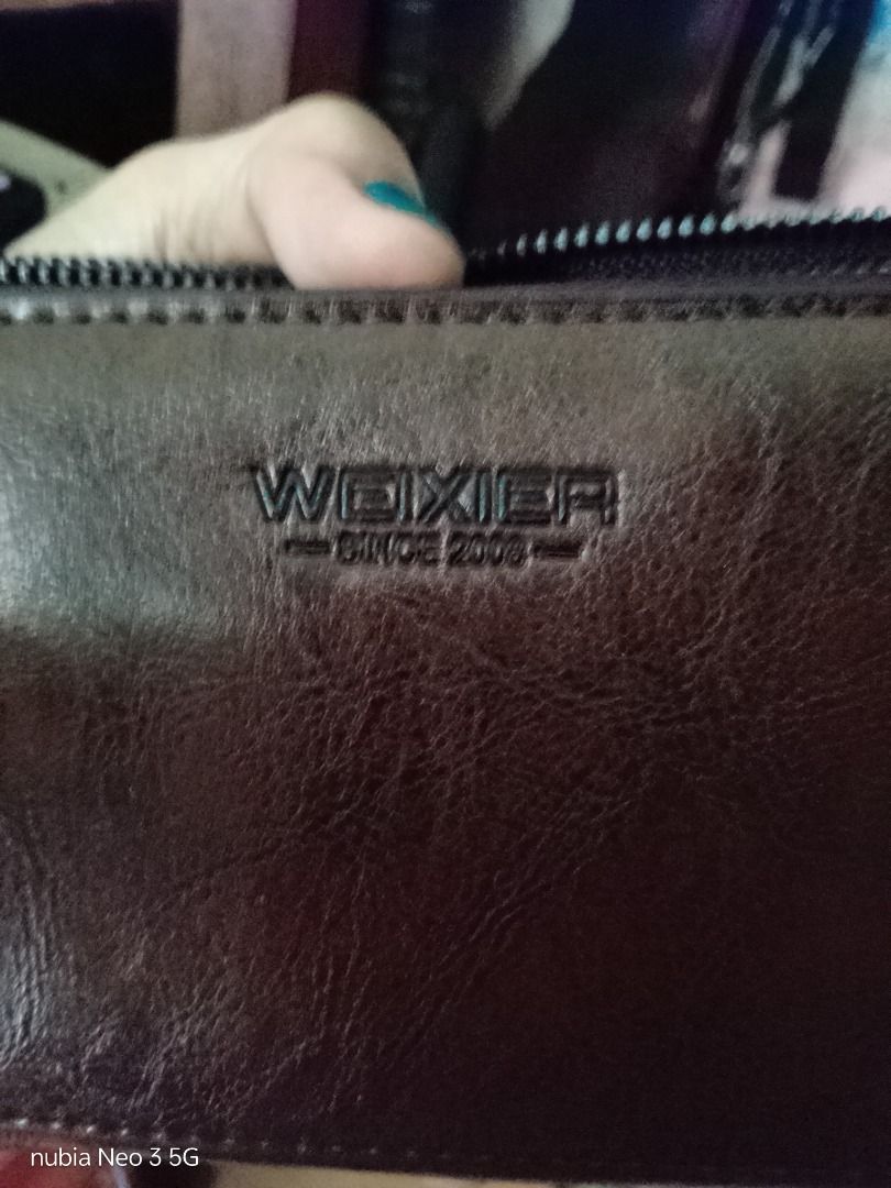 2zip wallet (Category: Clutches) located in Trece Martires City. Submitted by sulit_buys (Listing ID 1467054276, Image 1). Description: Genuine leather No issue.