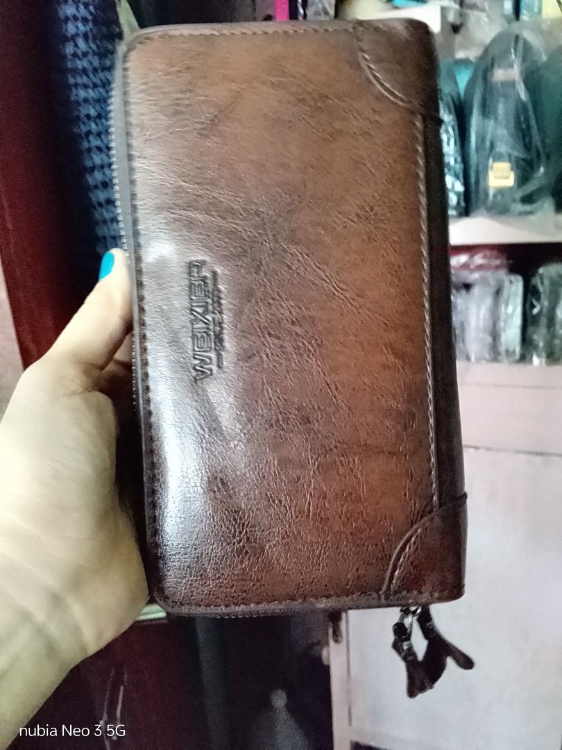 2zip wallet (Category: Clutches) located in Trece Martires City. Submitted by sulit_buys (Listing ID 1467054276, Image 3). Description: Genuine leather No issue.