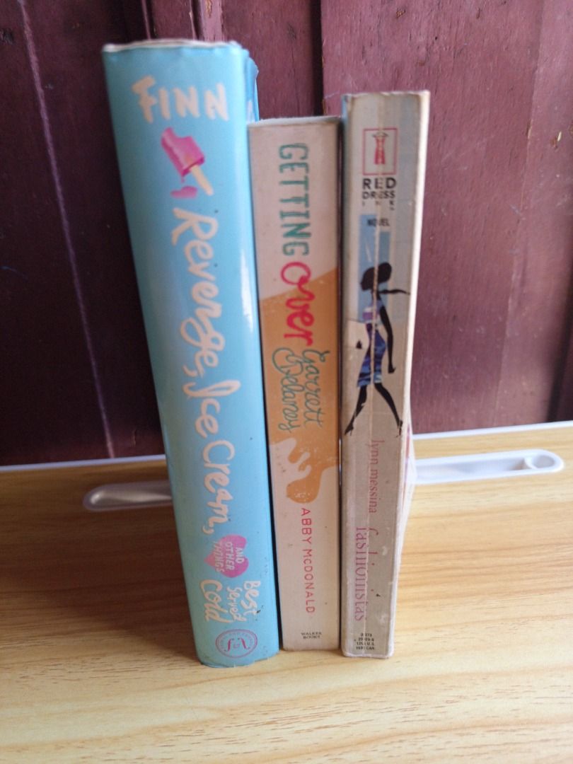 4 Book Bundle (Category: Storybooks) located in Cebu City. Submitted by poohdeebear (Listing ID 1467003084, Image 2). Description: - Fashionistas by Lynn Messina - Getting Over Garrett Delaney by Abby McDonald. - Revenge, Ice Cream, and Other Things Best Served Cold Hardbound (A Broken Hearts & Revenge Novel, 2) by Katie Finn - The Forget-Me-Not Summer by Leila Howland.