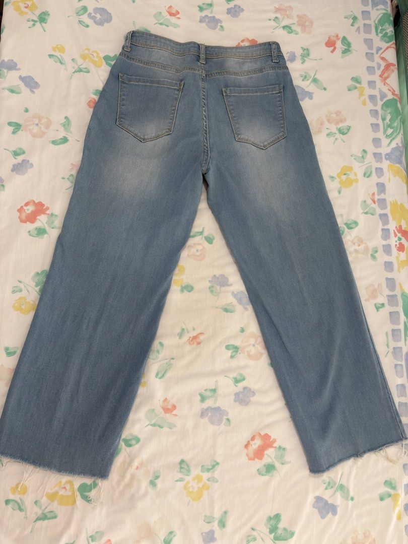6ixty8ight Light Wash Wide Leg Jeans Size Large (Category: Jeans) located in Manila. Submitted by katrine_gervacio (Listing ID 1466991733, Image 2). Description: - Brand: 6ixty8ight - Size: Large (165/70A fit) - Wash: Mid-blue light wash denim - Fit: High waist - Details: Front leg seam accents and raw-cut frayed hem - Pockets: Classic five-pocket design - Closure: Zip fly with metal button.