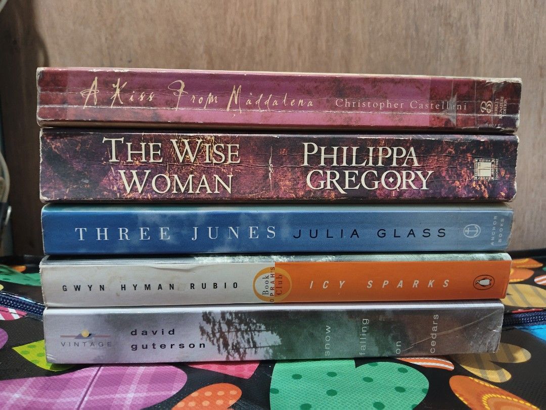 📚 PRELOVED LITERARY FICTION PAPERBACKS (Category: Storybooks) located in Taguig. Submitted by booksbynini (Listing ID 1467140581, Image 1). Description: 📚 PRELOVED LITERARY FICTION PAPERBACKS 💰 PRICE: ₱85 each | ₱385 if you take ALL 5 books ⚠️ CONDITION & FLAWS: Preloved used copies. Expect yellowed/tanned page edges, cover wear/scuffs, creased spines, and minor marks/sticker residue. Pages are complete, intact, and readable — no torn or missi