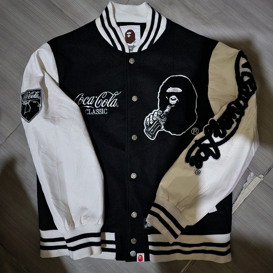 A Bathing Ape x Coca Cola Vartisy (Category: Coats, Jackets and Outerwear) located in Asingan. Submitted by add2kurt (Listing ID 1467143912, Image 1). Description: Dimension Width: 22 Inches Length: 27 Inches .