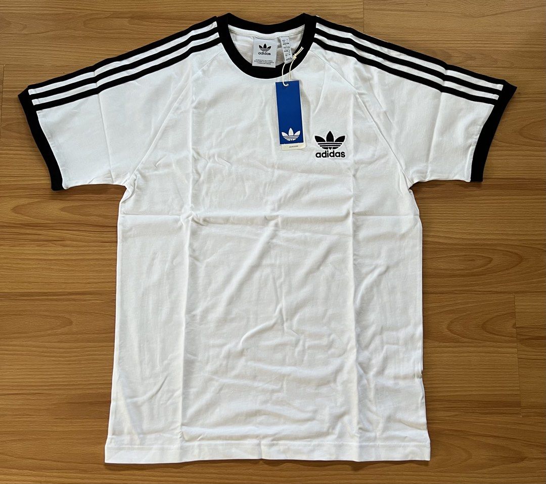 Adidas Adicolor Classics 3-Stripes Tee Shirt (Category: Tshirts & Polo Shirts ) located in Muntinlupa City. Submitted by abbysantosss (Listing ID 1467001006, Image 2). Description: Classic fit, super comfortable cotton fabric Brand new, never worn, with original store tag.