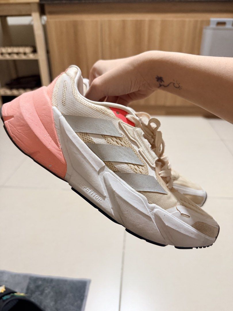 Adidas Adistar (Category: Sneakers) located in Mandaluyong City. Submitted by mntssapdrns (Listing ID 1467115011, Image 2). Description: - Brand: Adidas - Model: Adistar - Color: Beige with pink and silver accents - Features: Thick Repetitor midsole cushioning, durable Continental rubber outsole - Condition: Pre-loved, well-maintained - black rubber sole is missing (I removed it since natanggal na yung dikit but it doesn’t affect the performance)