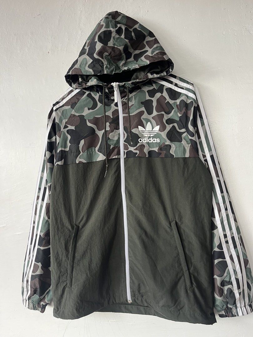 Adidas Camo Windbreaker Jacket Green White (Category: Coats, Jackets and Outerwear) located in Paranaque City. Submitted by commonfind.ph (Listing ID 1467054271, Image 2). Description: Adidas Camo Windbreaker Jacket Authentic Size Medium to Large 21x28 No issue Excellent 899+sf laspinas location.