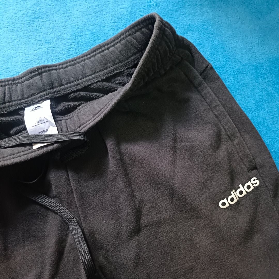 Adidas Essentials Plain Tapered Pants (Category: Joggers) located in Antipolo. Submitted by juliane_thrift-declutters (Listing ID 1467083521, Image 2). Description: Adidas Essentials Plain Tapered Pants Size: 31 inches (Adjustable) Length: 42 inches Thigh: 9.5 inches Leg Opening: 12 inches Issue: None Tags: Complete Wash Tags Overall Condition: 9.7/10 * Color may vary due to lighting.