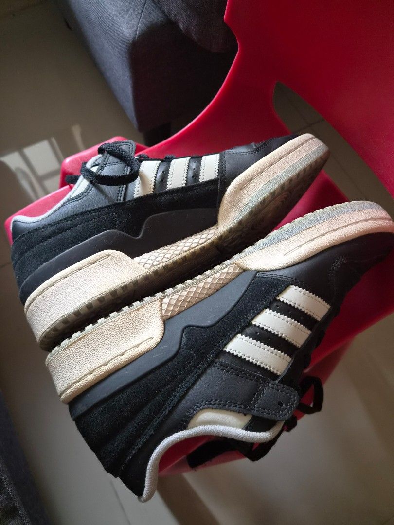Adidas Forum Low Black White US 8 (Category: Sneakers) located in Las Pinas. Submitted by jtcool (Listing ID 1466985936, Image 3). Description: - Brand: Adidas Forum Low - Color: Black and White with iconic three stripes and Trefoil logo - Size: US 8 / UK 7.5 / FR 41 1/3 - Condition: Normal wear on soles and inner collars, laces included - Style: Great casual everyday kicks.