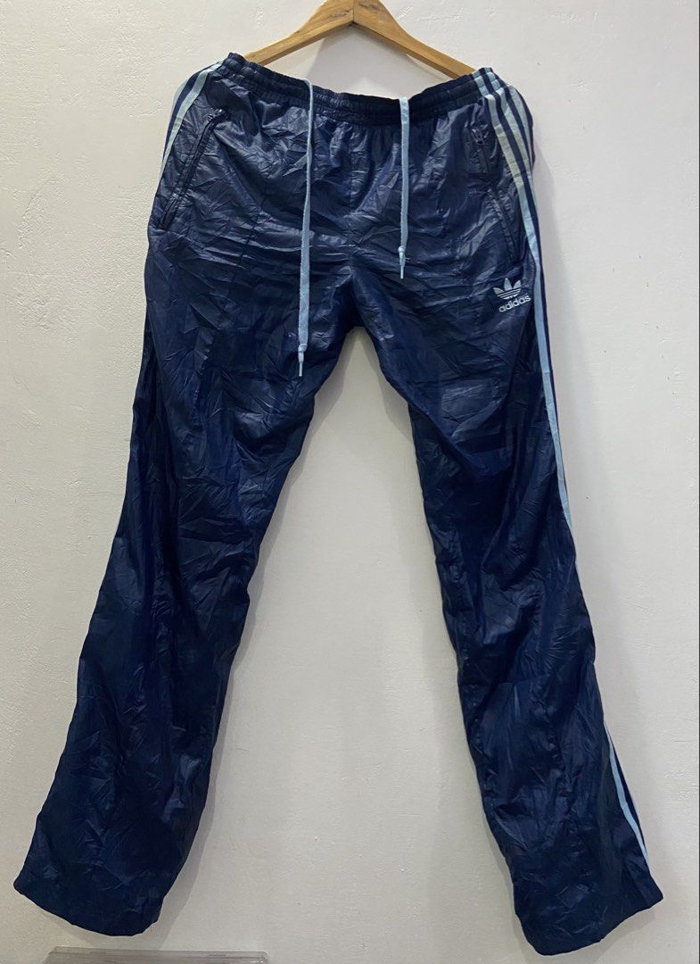 Adidas Nylon Track pants (Vintage ) (Category: Coats, Jackets and Outerwear) located in Tukuran. Submitted by retrothrifter88 (Listing ID 1467037831, Image 1). Description: Waist stretchable to 32 -35 Issue nasa pic.