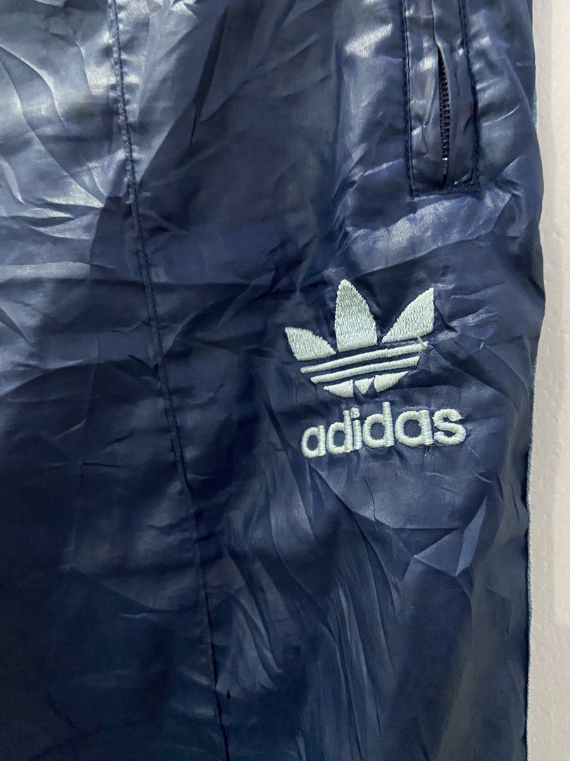 Adidas Nylon Track pants (Vintage ) (Category: Coats, Jackets and Outerwear) located in Tukuran. Submitted by retrothrifter88 (Listing ID 1467037831, Image 2). Description: Waist stretchable to 32 -35 Issue nasa pic.