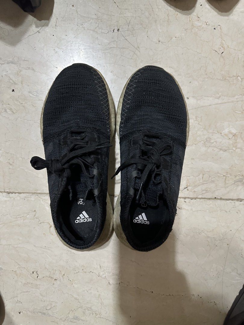 Adidas Pureboost Black Running Shoes (Category: Sneakers) located in Manila. Submitted by bobberbob797701 (Listing ID 1467030320, Image 1). Description: - Brand: Adidas Pureboost - Color: All Black with White Boost midsole - Upper: Breathable knit material with matching black laces - US 3 1/2 - Condition: Used, with some wear and dirt on the midsole; rubber outsole still has great traction - Features: Signature Adidas logo on insole - Best for: E