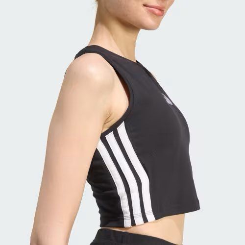 Adidas tank top (Category: Activewear) located in Pasig City. Submitted by dealwithgia (Listing ID 1467023555, Image 2). Description: strechy fabric large size 8/10 condition.
