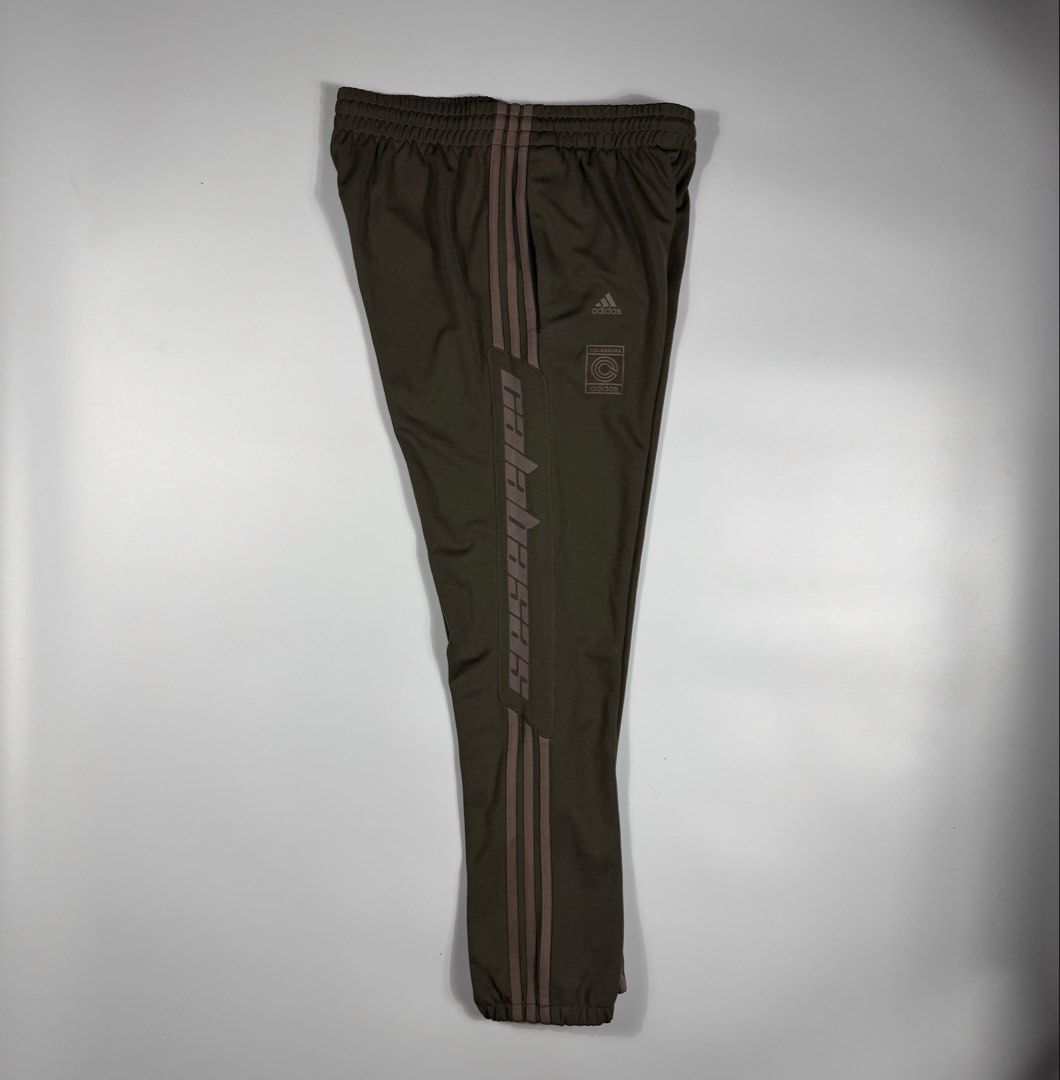 Adidas Yeezy Calabasas Track Pants (Category: Joggers) located in Bacolod City. Submitted by freshstuff13 (Listing ID 1467057038, Image 2). Description: Authentic Adidas Yeezy Calabasas track pants - Colorway: Earth Green - Condition: 10/10, clean with no flaws on fabric or prints - Features: Classic three-stripes, secure zippered side pockets, elastic waistband, and ribbed ankle cuffs - Branding: Signature Calabasas text print - Material: Soft, 