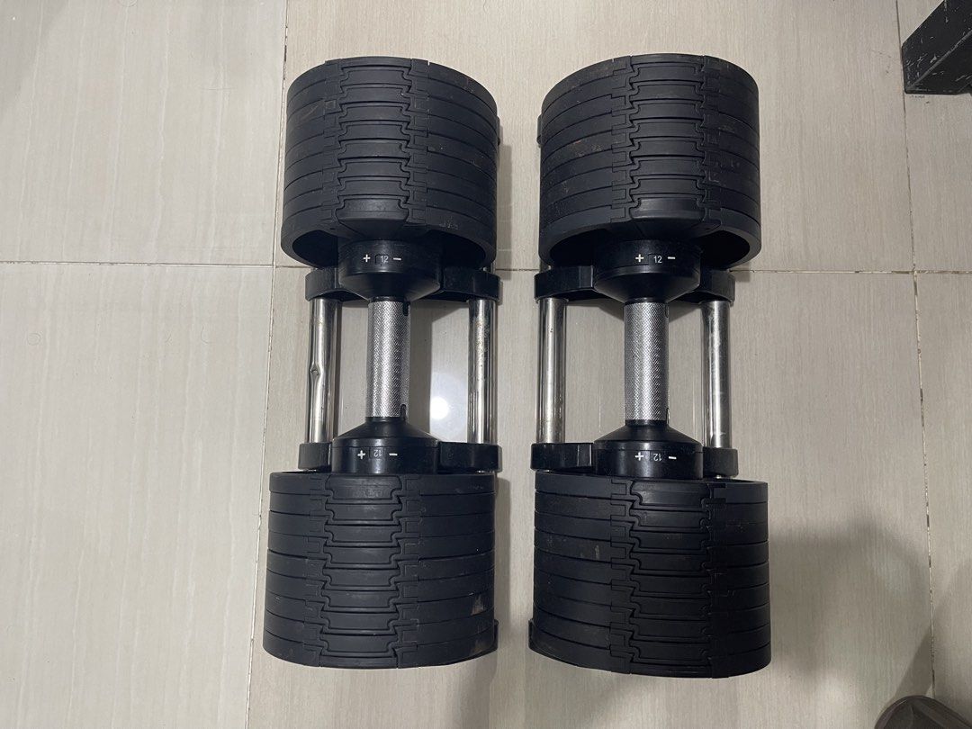 Adjustable Dumbbells Set with Weight Plates (Category: Weights & Dumbbells) located in Manila. Submitted by anrmarchad69199 (Listing ID 1467077035, Image 1). Description: - Pair of adjustable dumbbells with space-saving design - Replaces multiple dumbbell sets for home workouts - Metal knurled handles ensure a solid, secure grip - Easy end-adjustment mechanism with weight indicators up to 12 - Includes sturdy metal base trays to safely hold plate