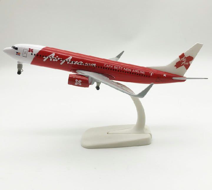 AirAsia Diecast Model Airplane with Display Stand (Category: Vehicle & Diecast Models) located in Manila. Submitted by iliasjen3082126 (Listing ID 1467051639, Image 1). Description: - AirAsia collectible airplane model in classic red and white livery - Includes a matching display stand for sturdy desk placement - Features detailed wings, engines, and tail fin - Great gift or display piece for aviation enthusiasts.